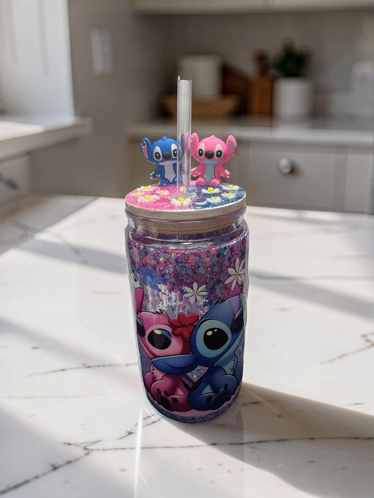 Stitch and angel snow globe