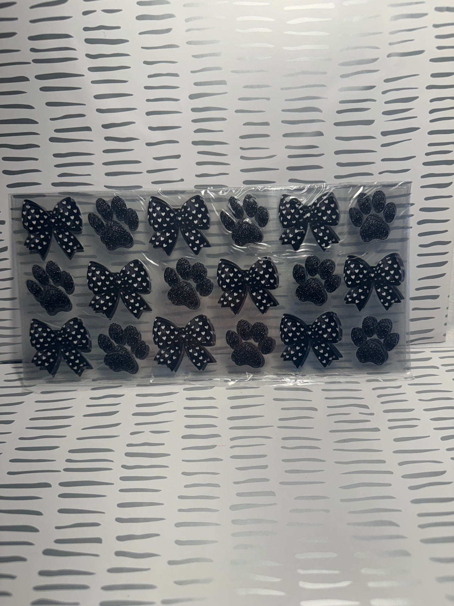 141 Black Dog Paw and bow